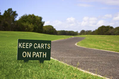 Picture of a asphalt path for golf  carts 